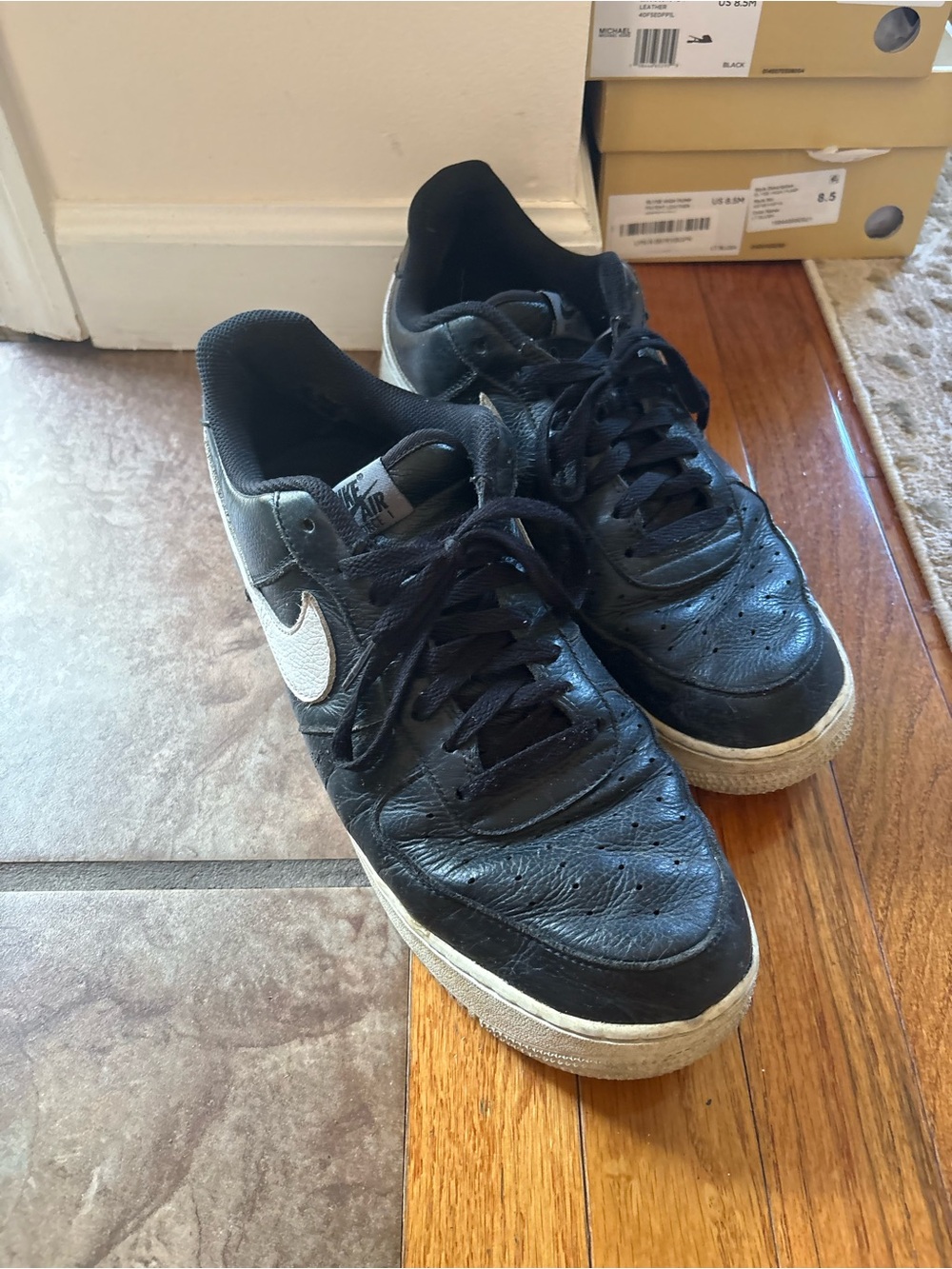 Nike Black Low-Top Sneakers with White Swoosh size 12